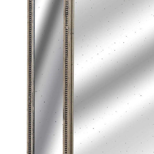 Close-up of a metallic surface with a reflective pattern
