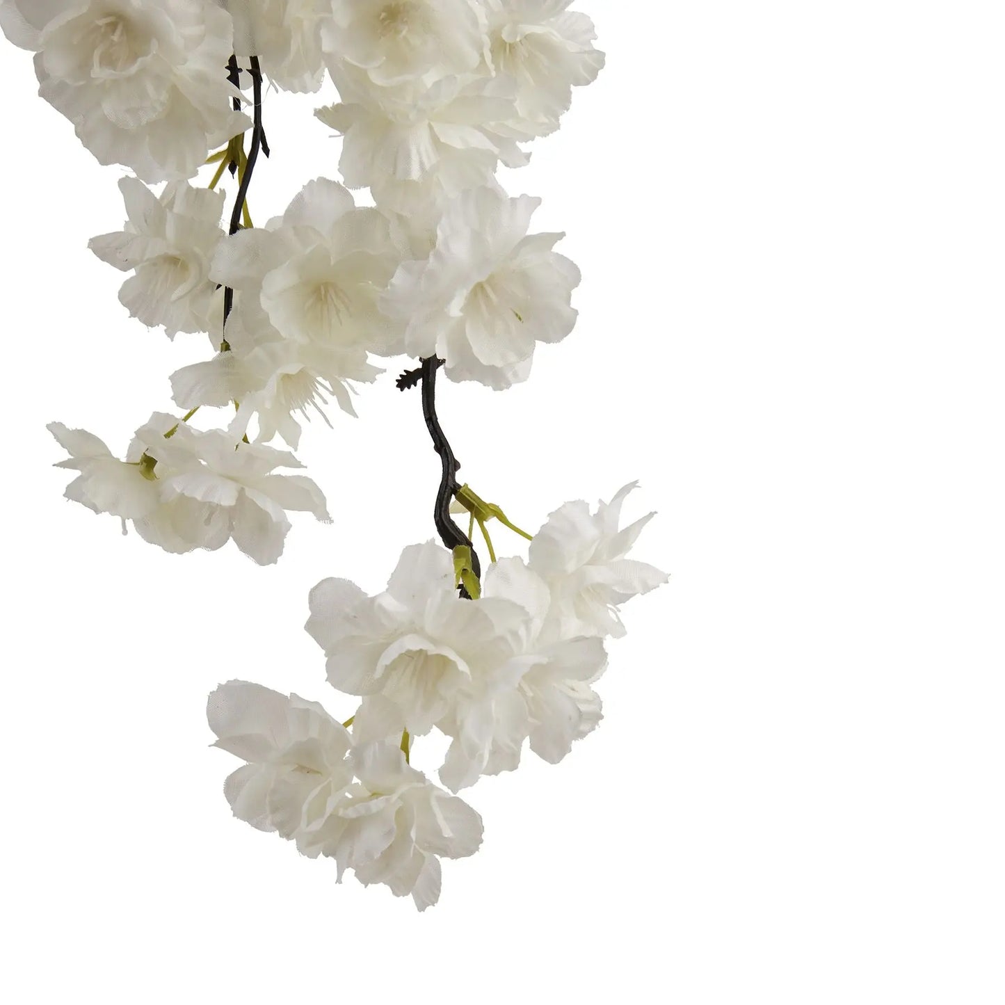 Artificial white cherry blossom branch on a white background