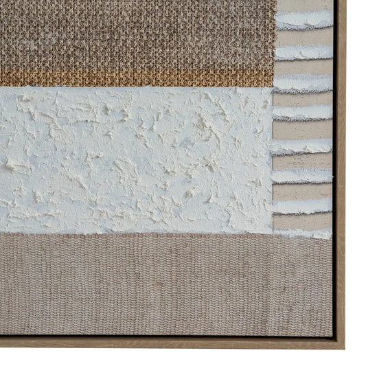 Close-up of a textured wall with different material samples.