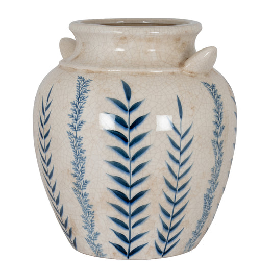 Ceramic vase with blue leaf patterns on a beige background