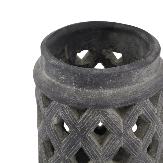 Decorative stone lantern with geometric pattern on a white background