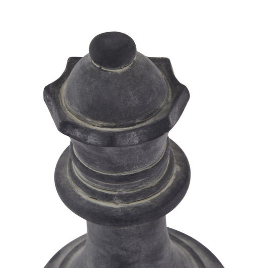 Decorative black metal finial on a white background