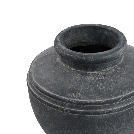 Black ceramic pot on a white background