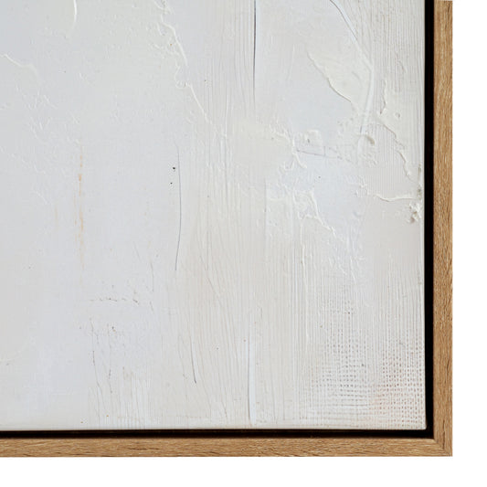 Close-up of a textured white canvas with a wooden frame on a white background