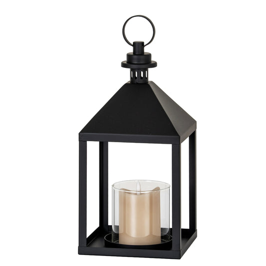 Black lantern with a candle inside on a white background