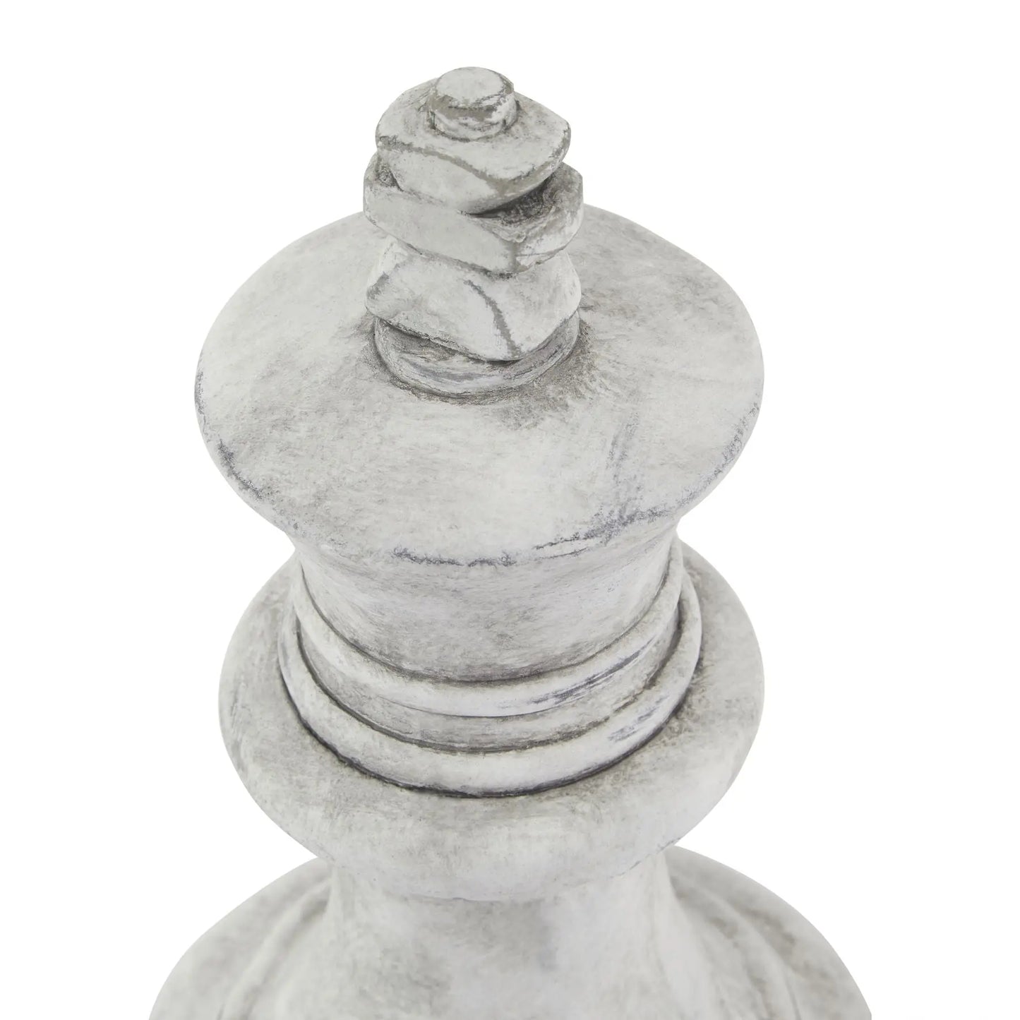 Decorative white stone object with a textured surface on a white background