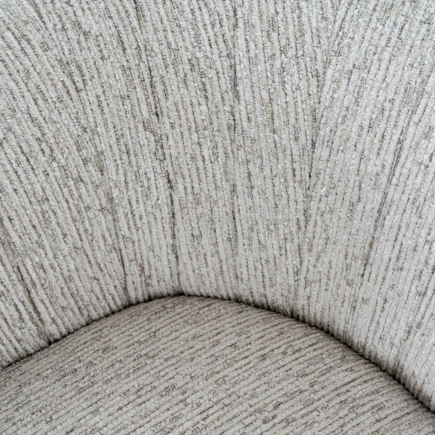 Close-up of textured gray fabric with a subtle pattern