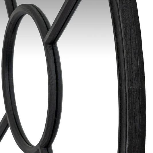 Close-up of black metal circular design on a white background