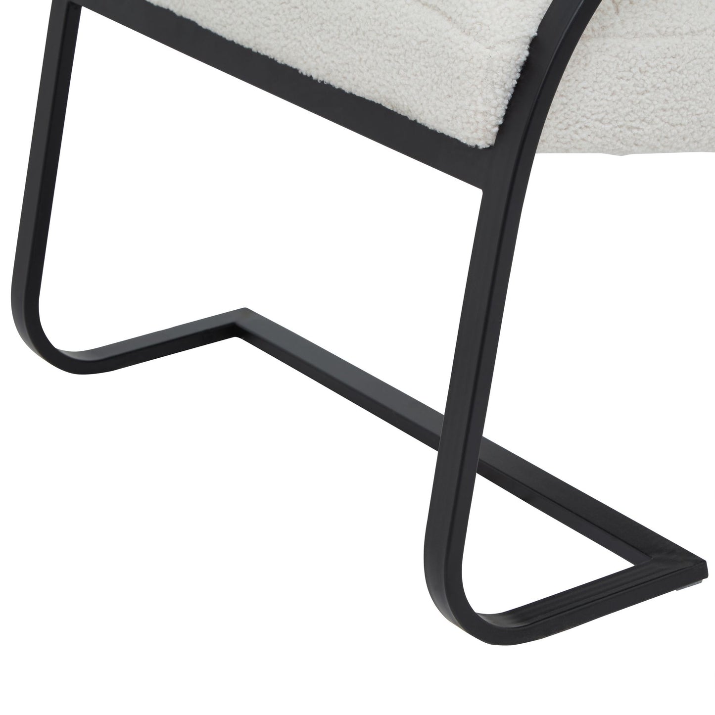 Close-up of a chair with black metal frame and white cushion on a white background