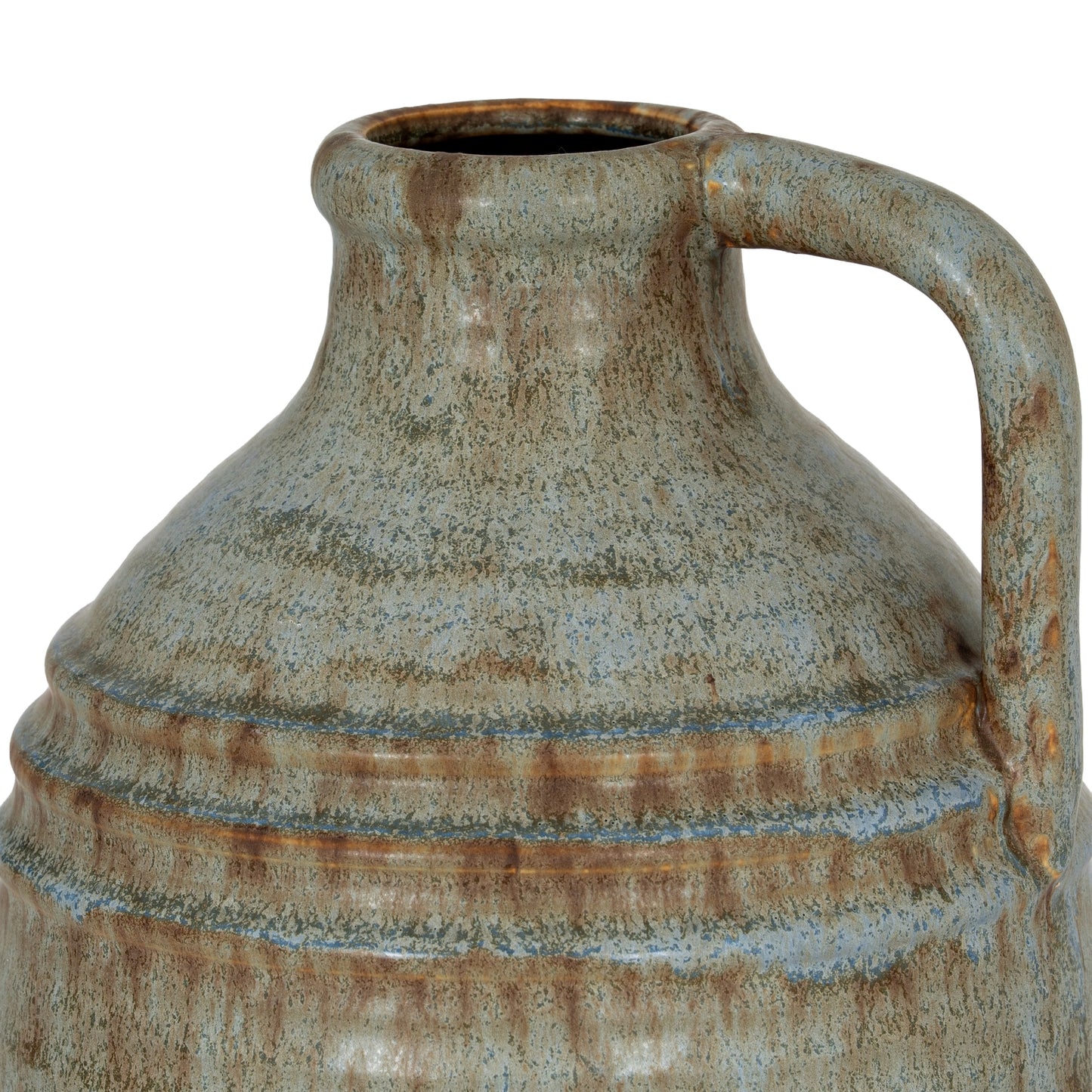 Rustic ceramic pitcher with a handle on a white background