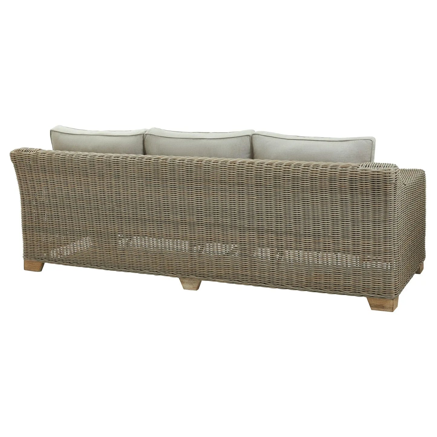 Wicker outdoor sofa with light gray cushions on a white background