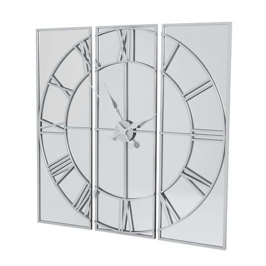 Triptych wall clock with glass panels on a white background