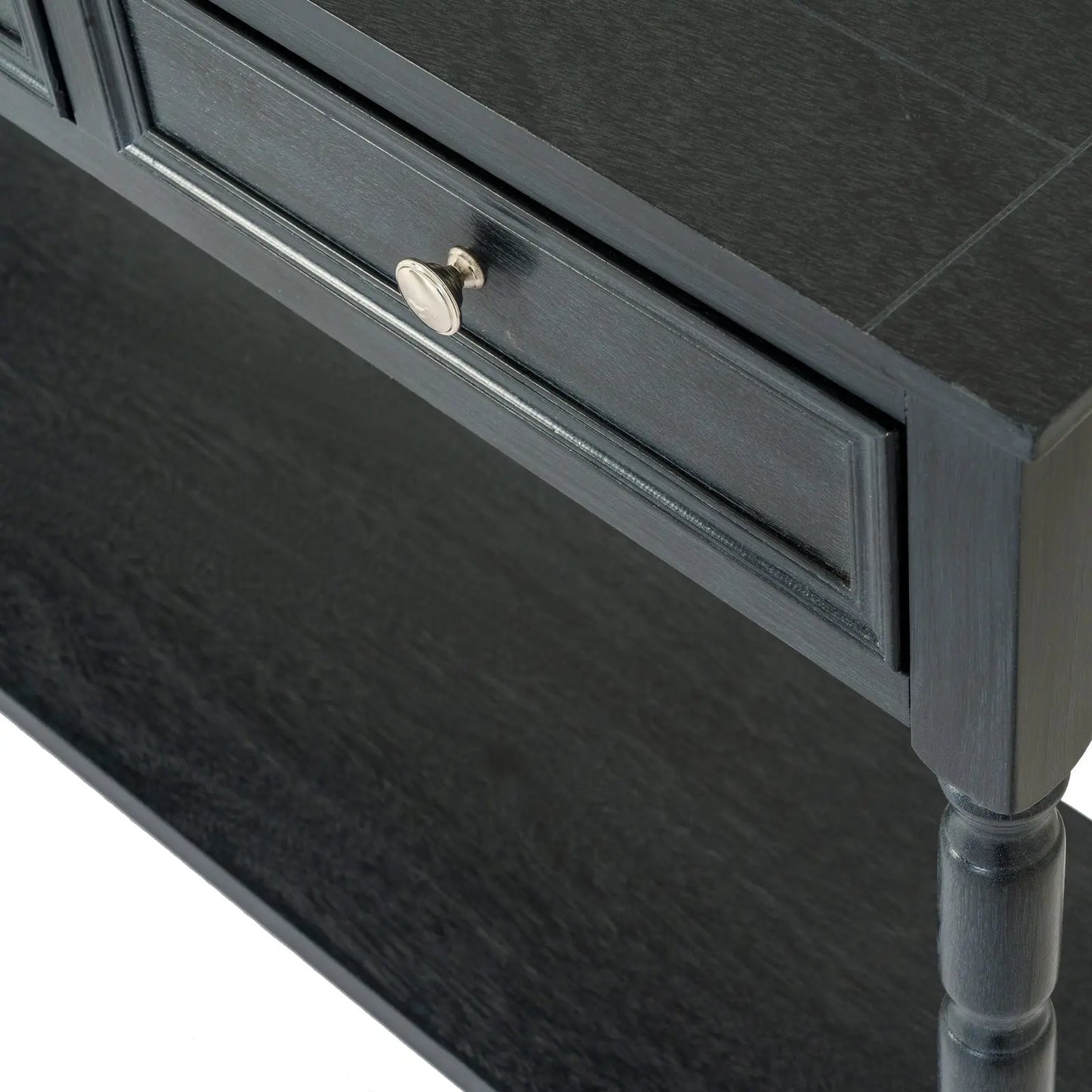 Dark wooden desk with a drawer and metal handle on a white background