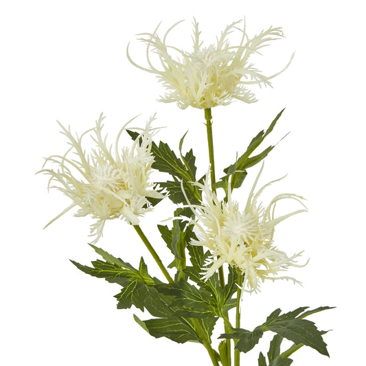 White artificial flowers with green stems on a white background