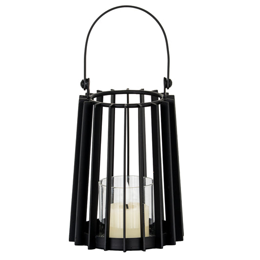 Black metal lantern with a candle inside on a white background