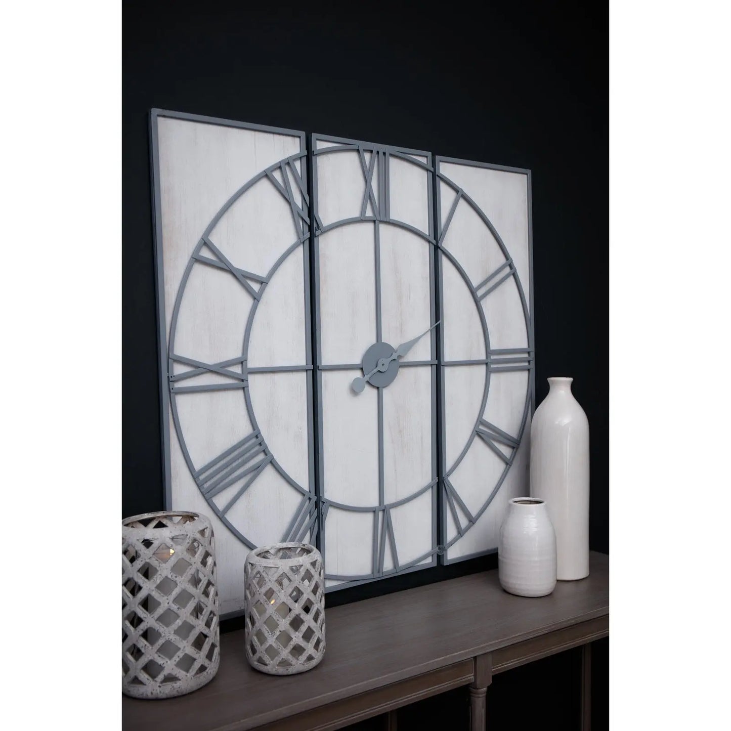 Decorative wall clock with Roman numerals on a dark background
