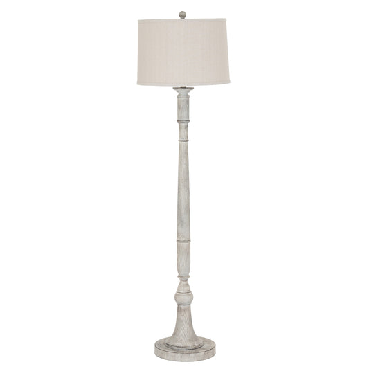 Floor lamp with a white shade on a white background