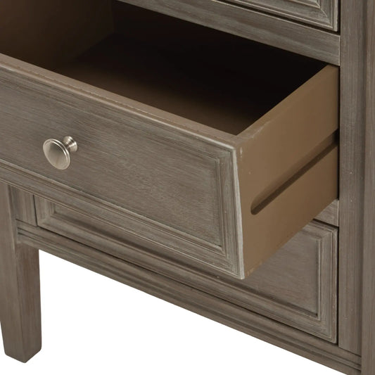 Wooden drawer with a metallic handle on a white background