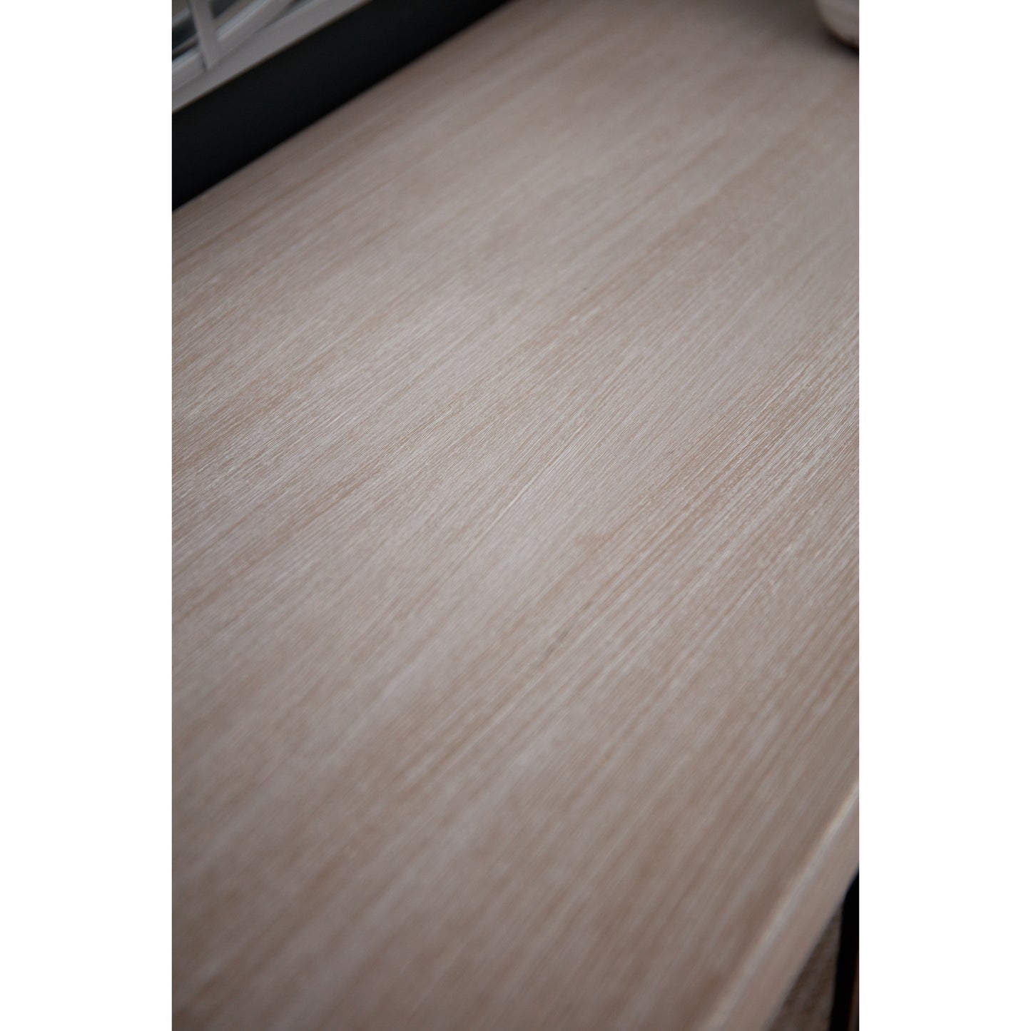 Close-up of a wooden surface with a light brown color.