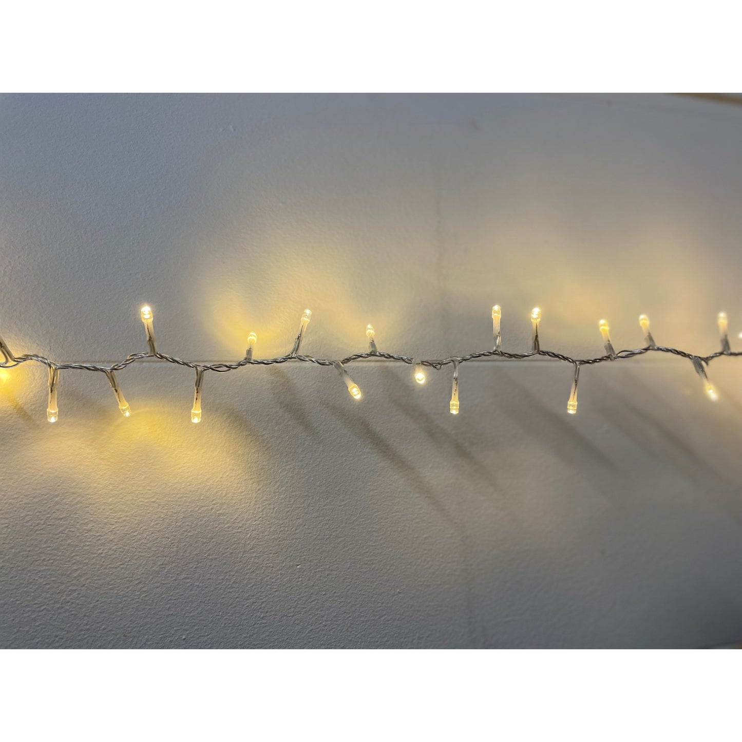 String of lights on a white wall