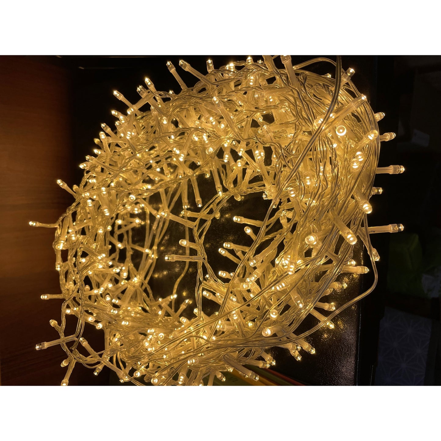 Coiled string of lights on a dark background