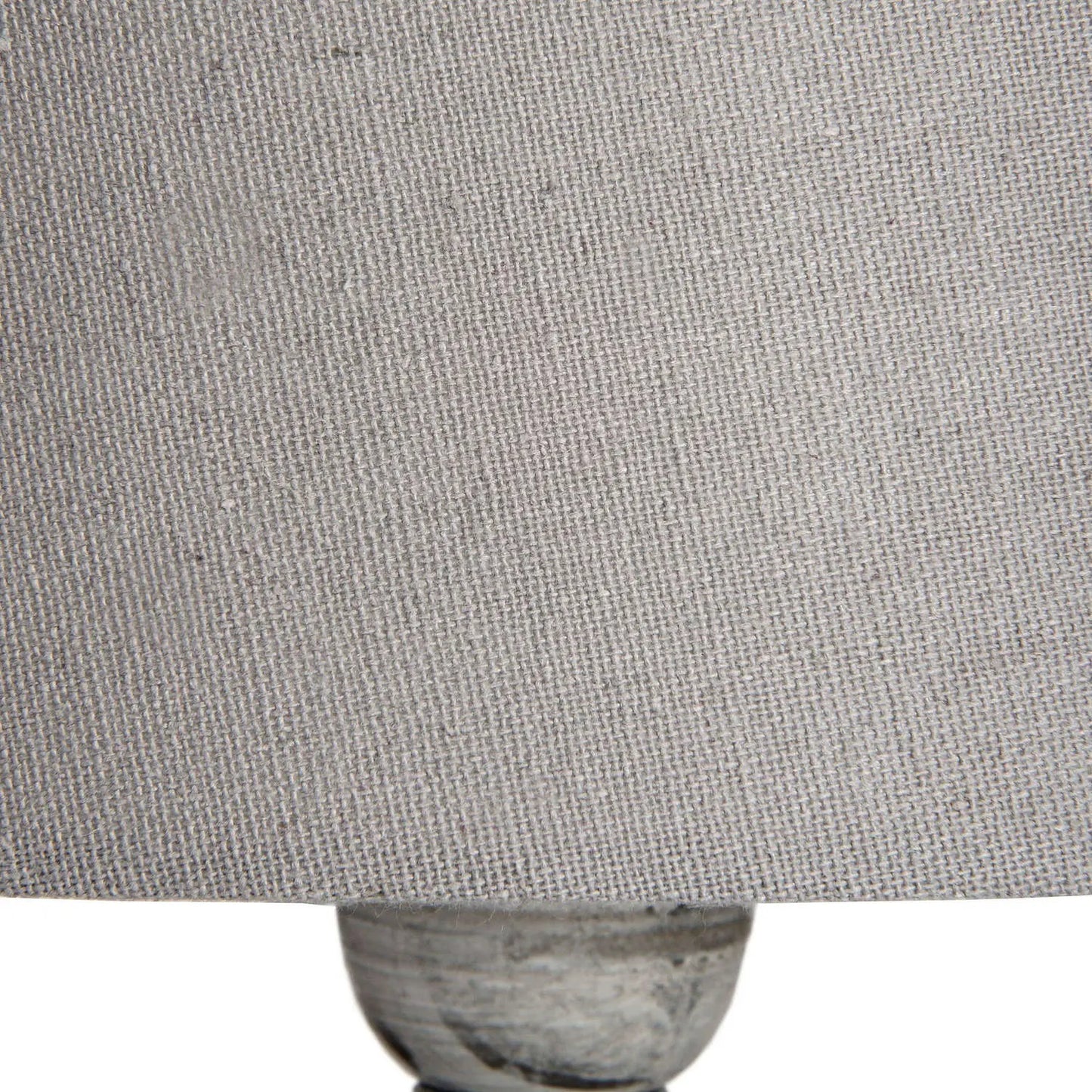 Close-up of a textured gray fabric surface