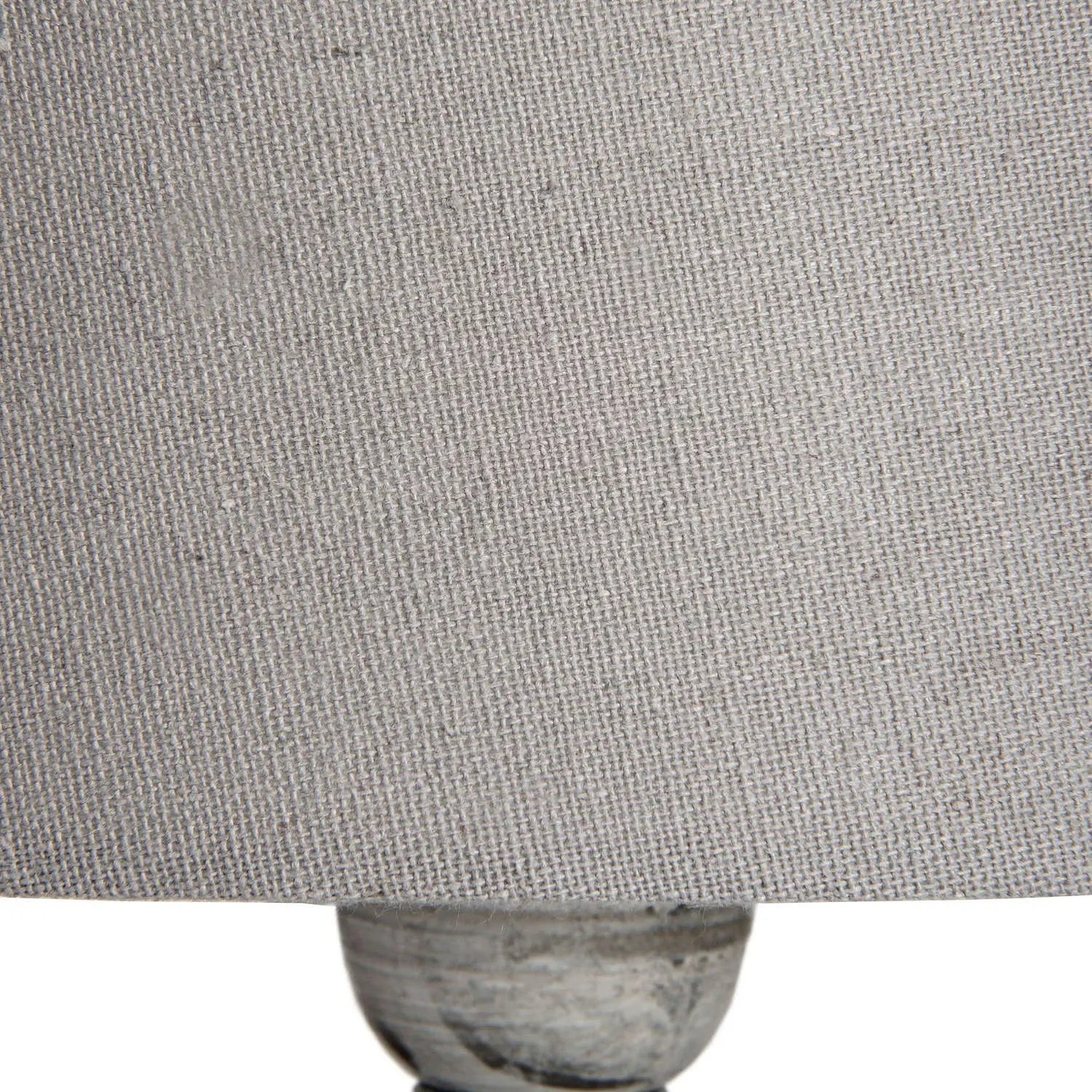 Close-up of a textured gray fabric surface