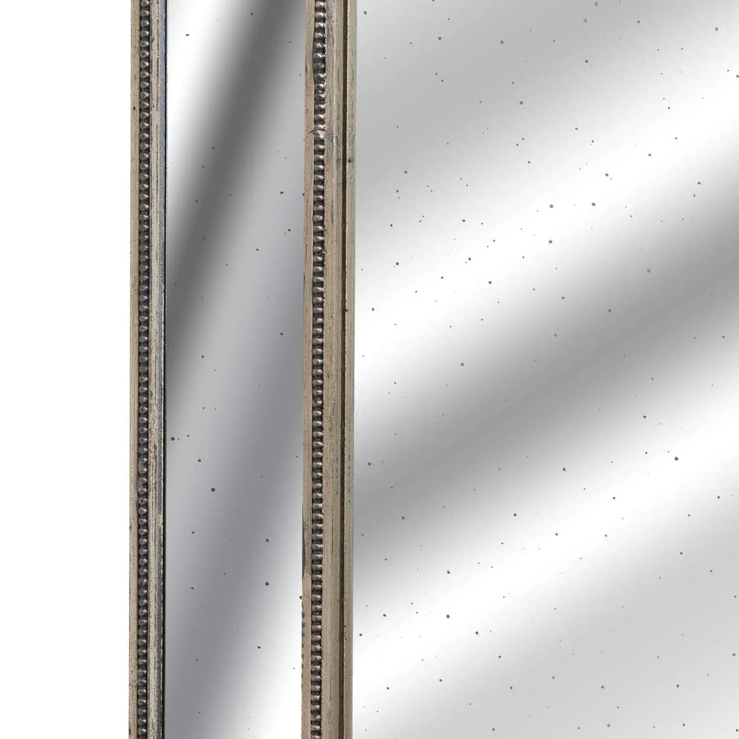 Close-up of a metallic surface with a reflective pattern