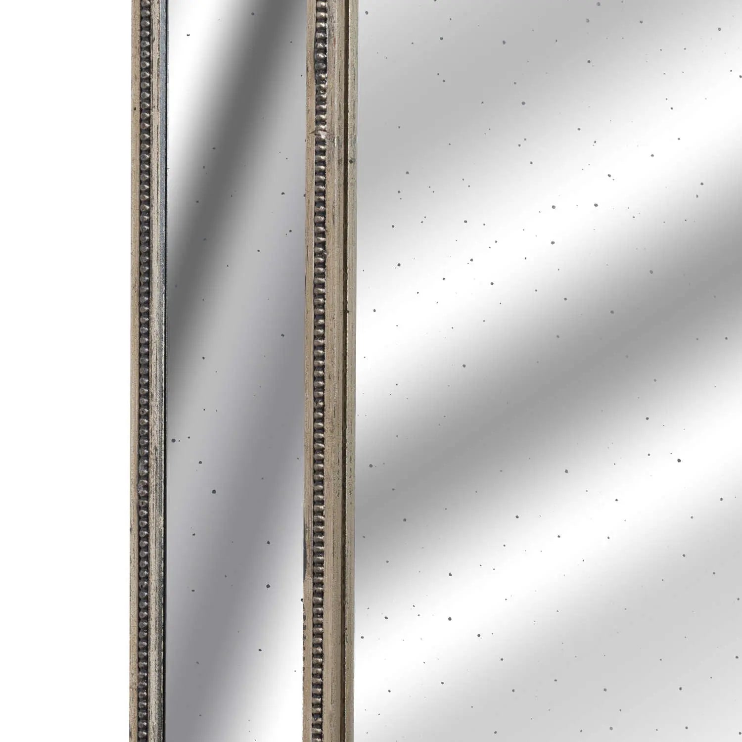 Close-up of a metallic surface with a reflective pattern