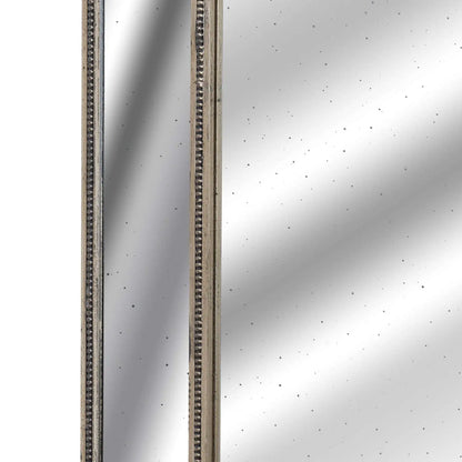 Close-up of a metallic surface with a reflective pattern