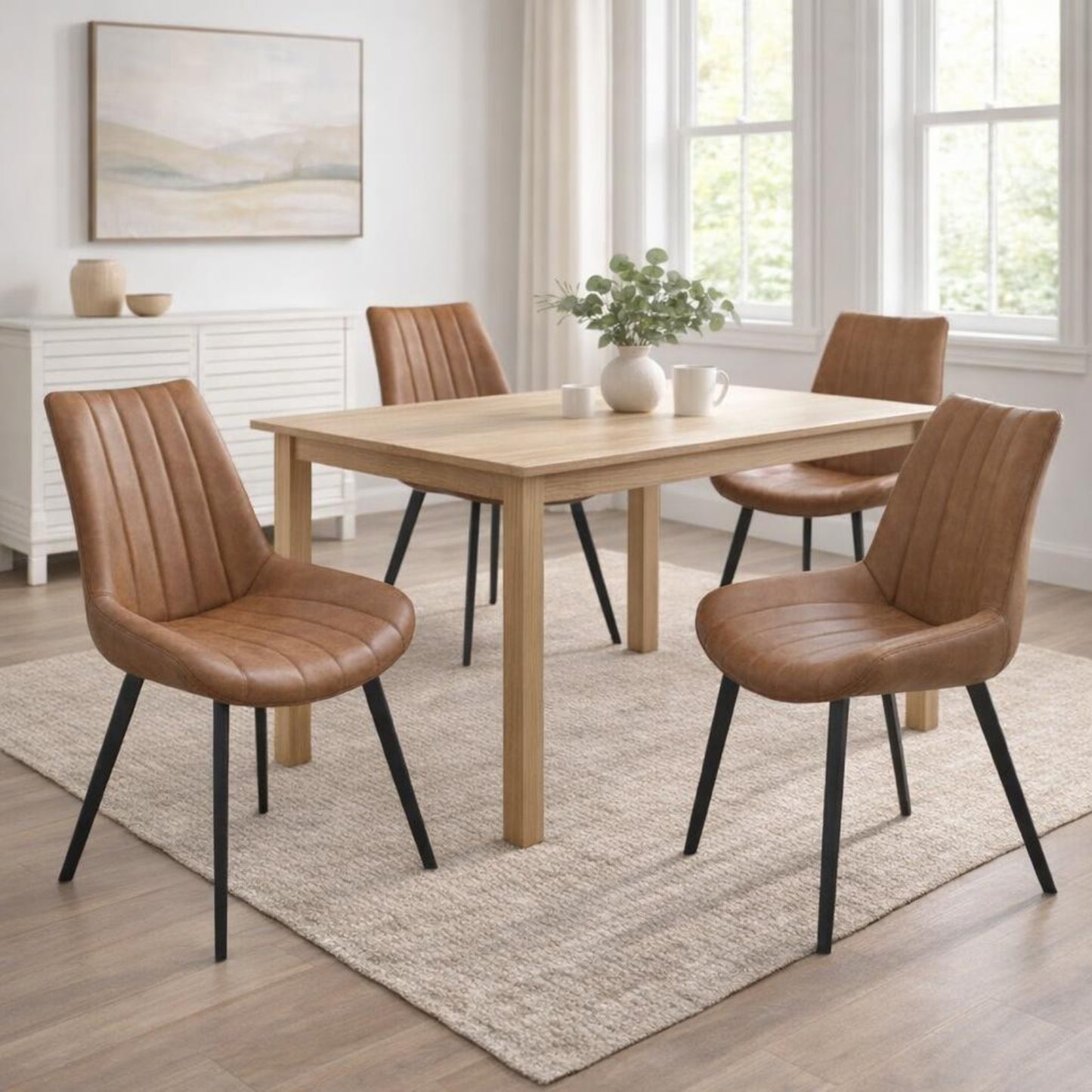Dining room with wooden table and brown chairs in a bright room.