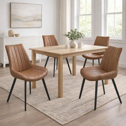 Dining room with wooden table and brown chairs in a bright room.