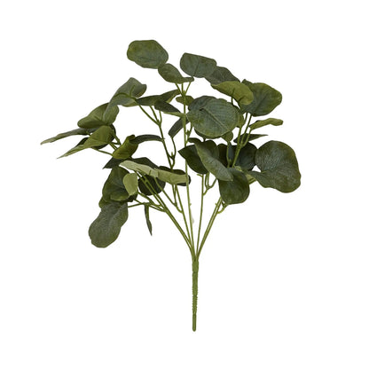 Artificial green leaf branch on a white background