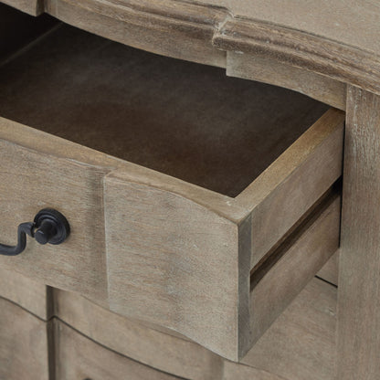 Close-up of a wooden drawer with a rustic finish