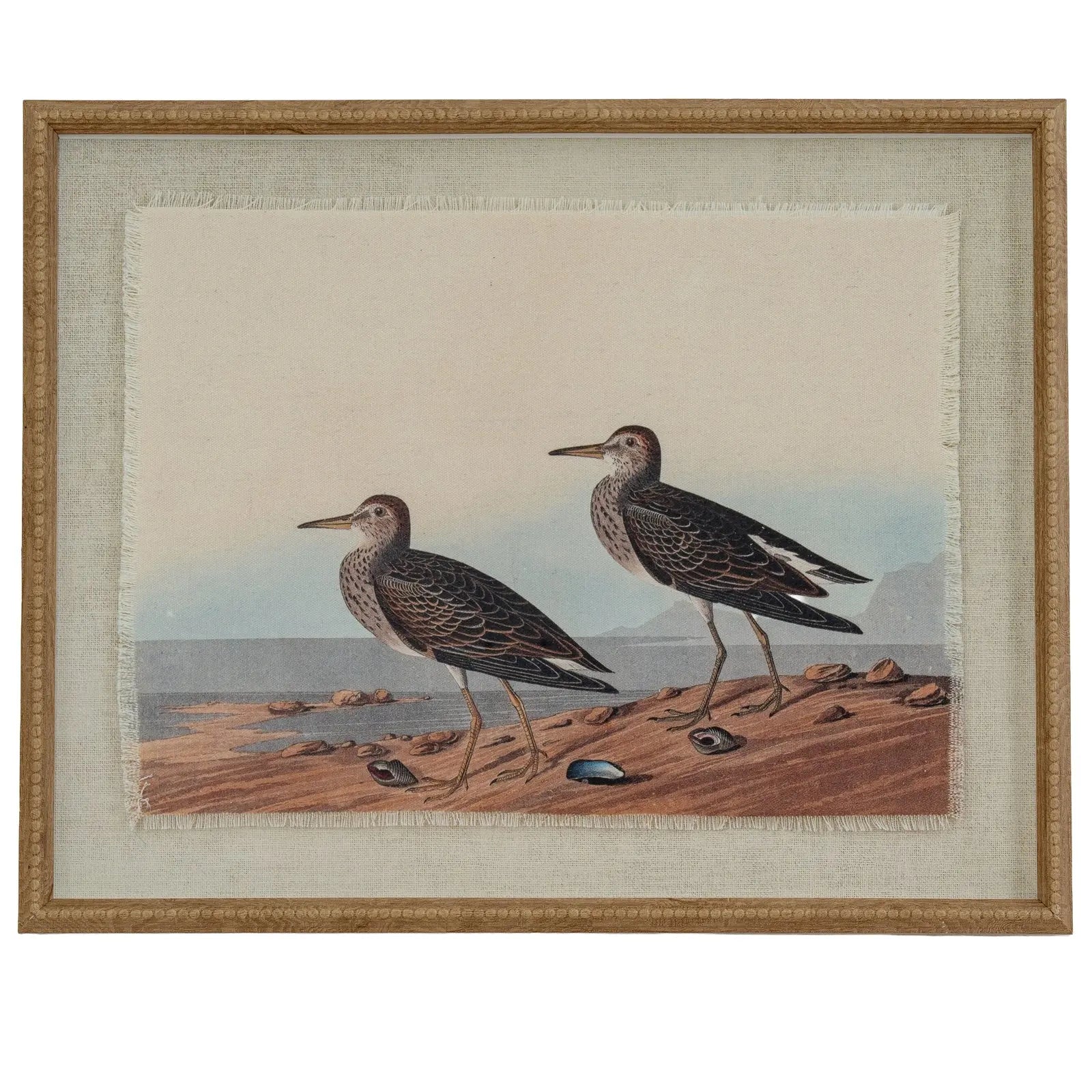 Framed artwork of two birds on a beach with a beige background