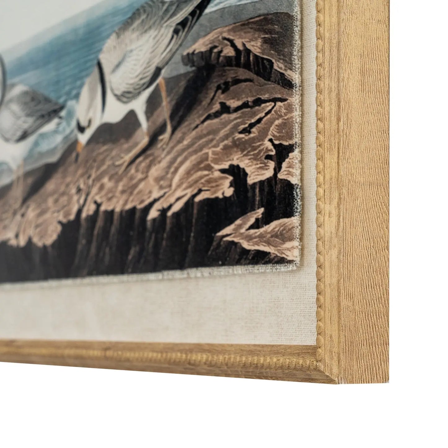 Wooden frame with a detailed nature scene, possibly of birds and mountains.
