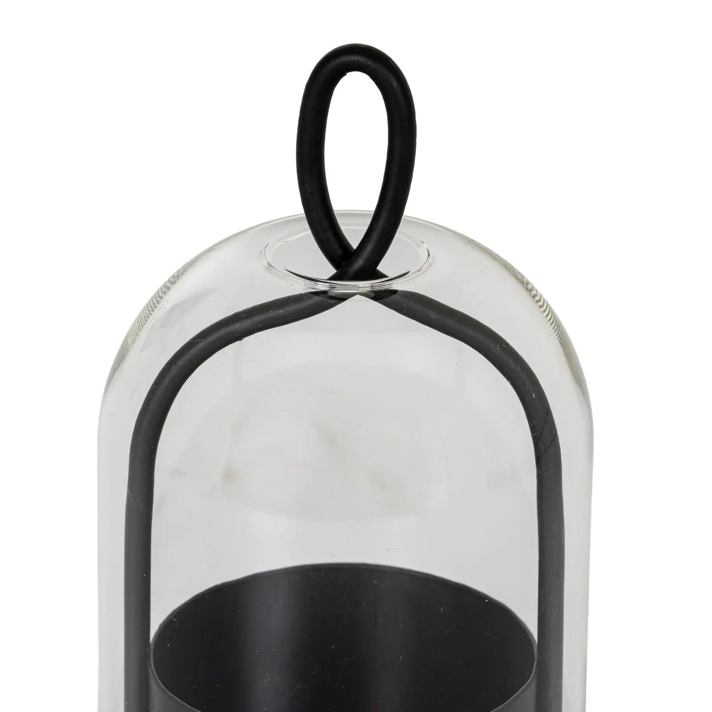 Clear glass cloche with black metal handle on a white background