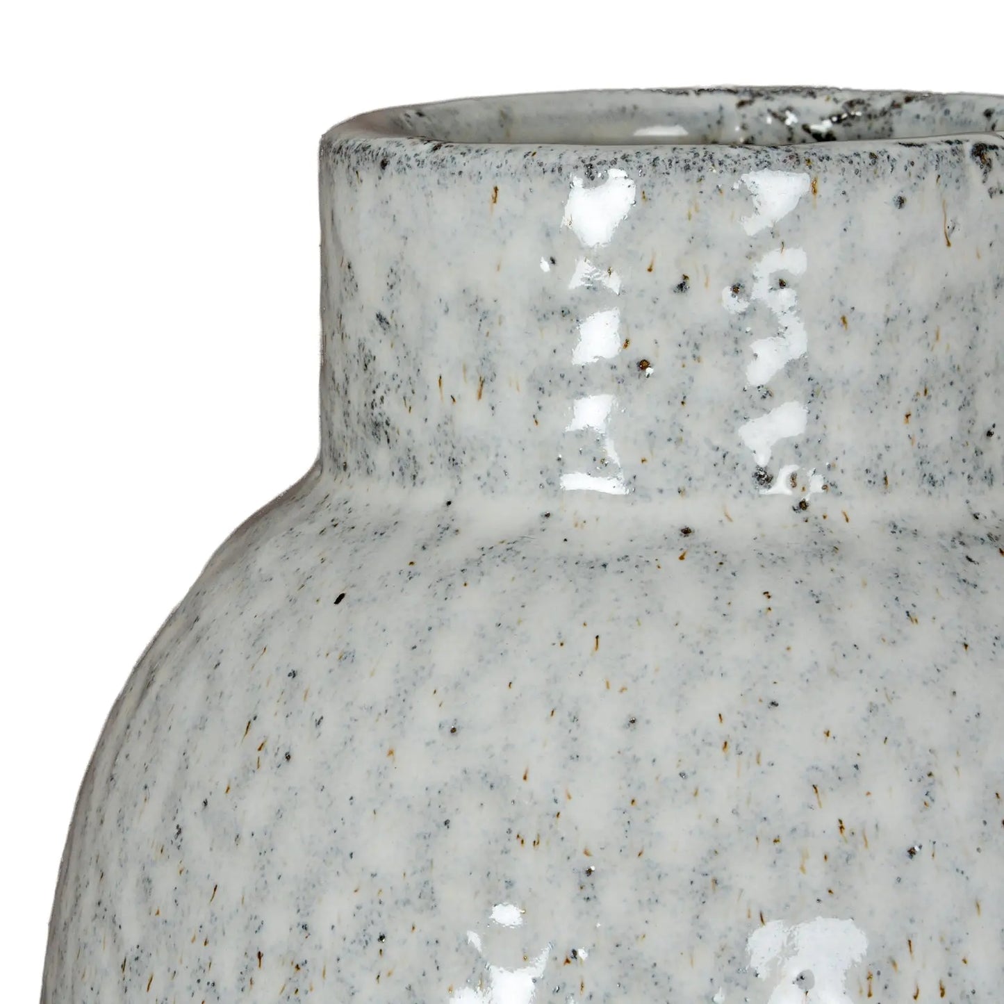 Close-up of a textured ceramic vase on a white background