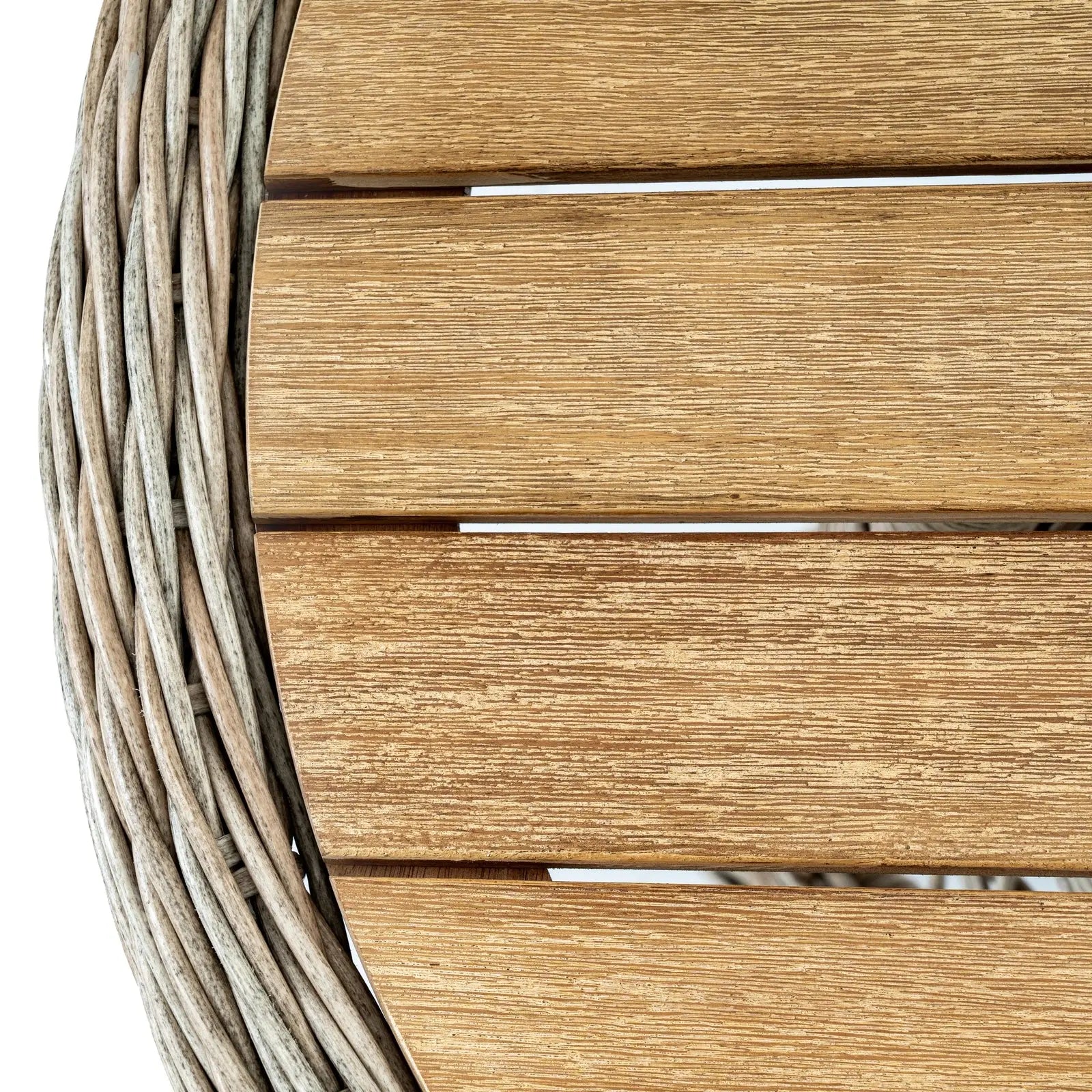 Close-up of a wooden chair with woven armrests on a white background
