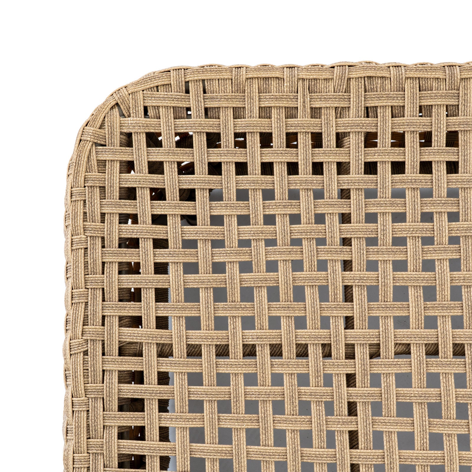 Close-up of a woven chair seat with a geometric pattern on a white background