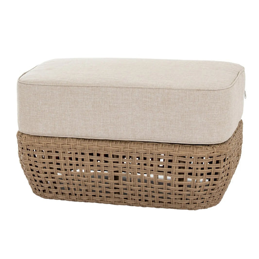 Wicker ottoman with a beige cushion on a white background