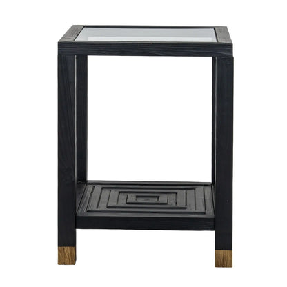 Black side table with glass top on a white background