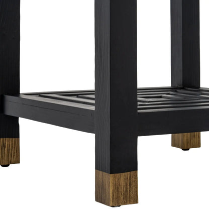 Close-up of a black metal frame with wooden feet on a white background