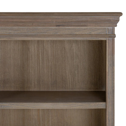 Wooden bookshelf with a single shelf on a white background