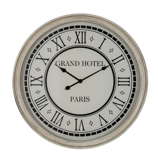 Round wall clock with 'Grand Hotel Paris' text on a white background
