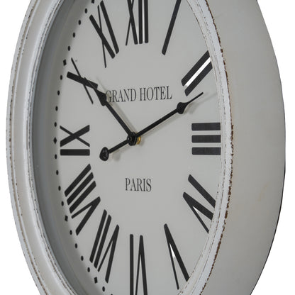 Round wall clock with 'Grand Hotel Paris' text on a white background