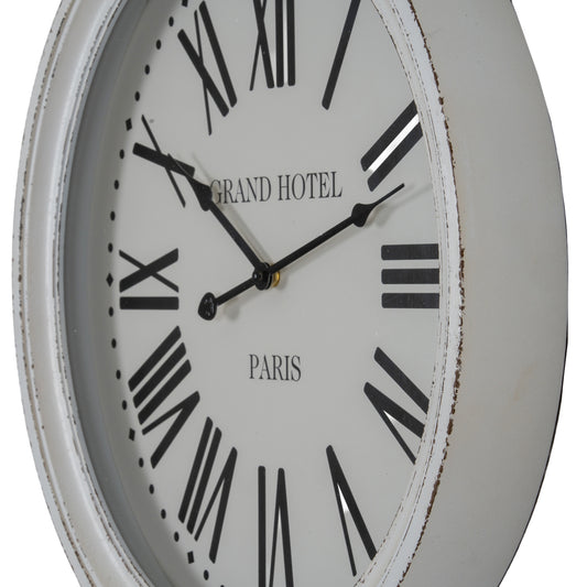 Round wall clock with 'Grand Hotel Paris' text on a white background