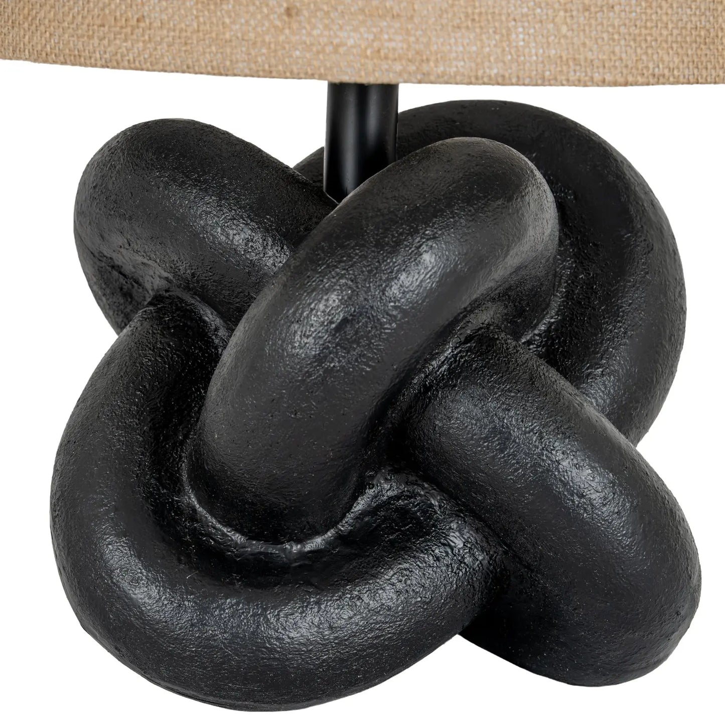 Decorative black knot design on a white background