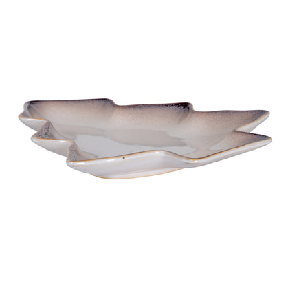 Decorative ceramic plate with wavy design on a white background