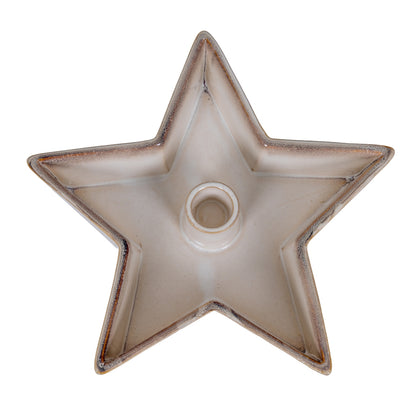 Star-shaped ceramic candle holder on a white background